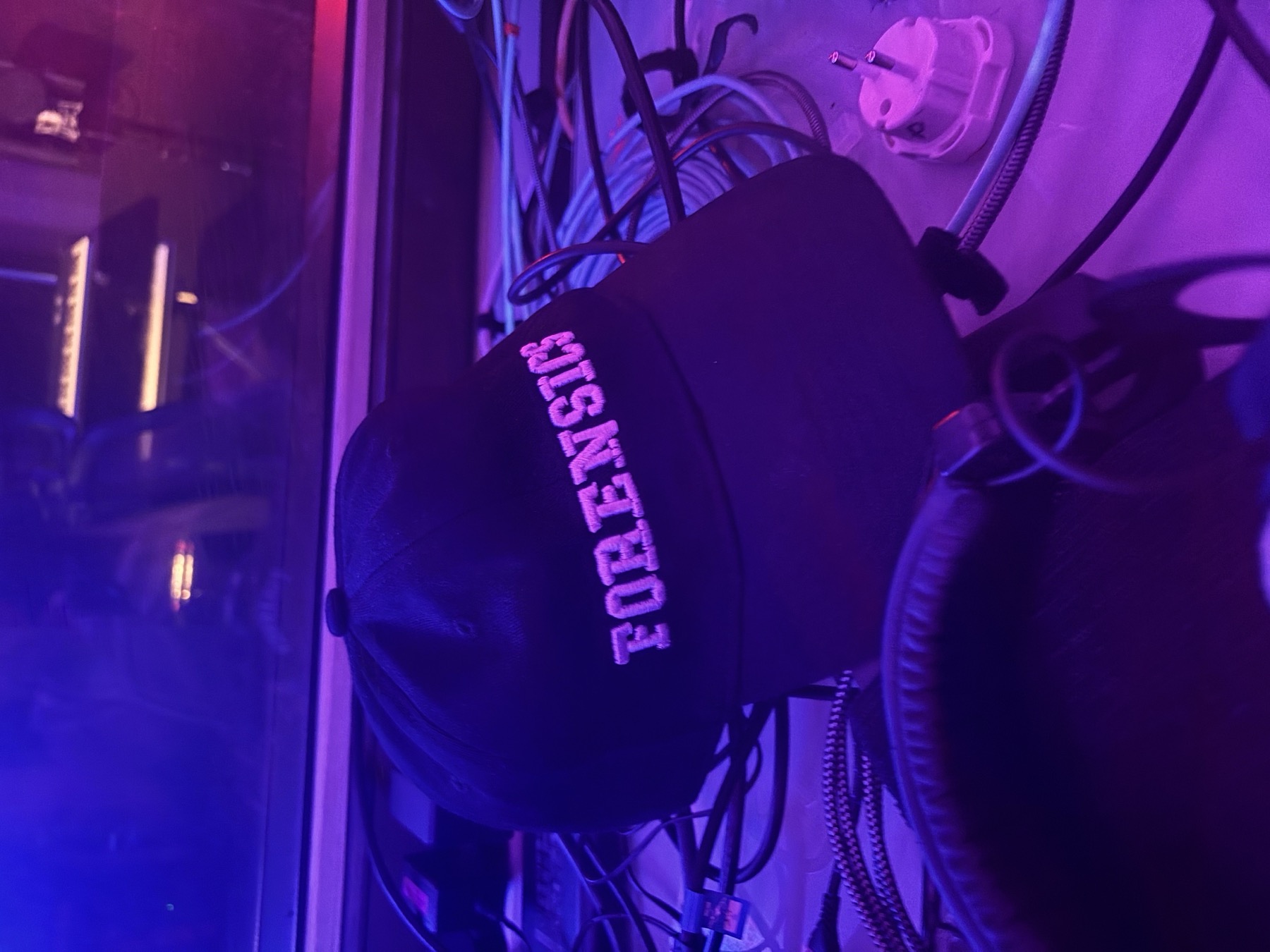 FORensics cap in purple studio light