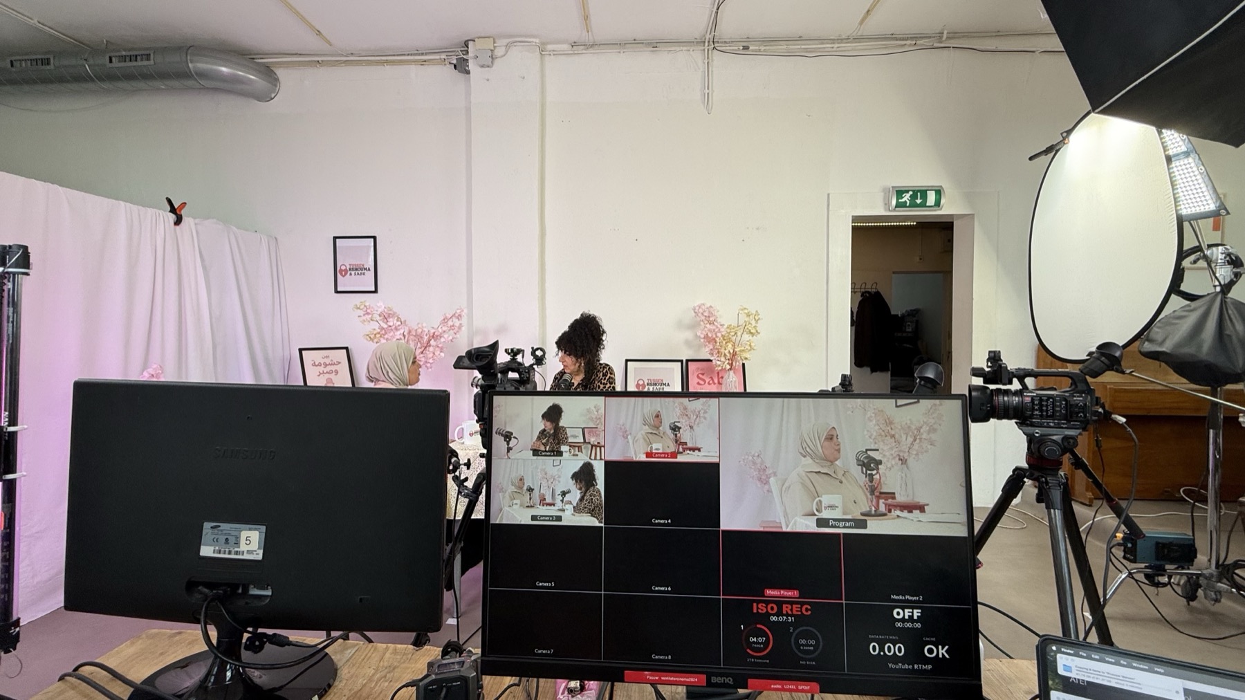 Podcast control room with programme monitor